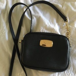 Michael kors black and gold crossbody bag